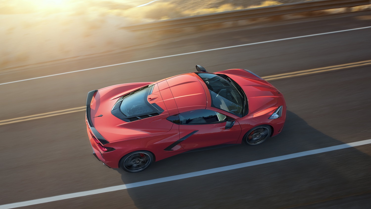 2020 Chevrolet Corvette Stingray going down a road.
