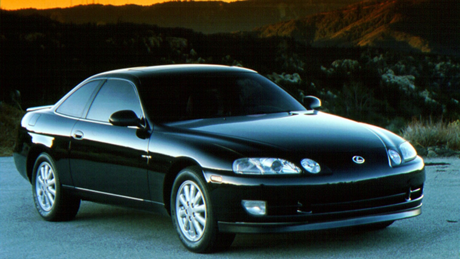 A black Lexus SC 400.
