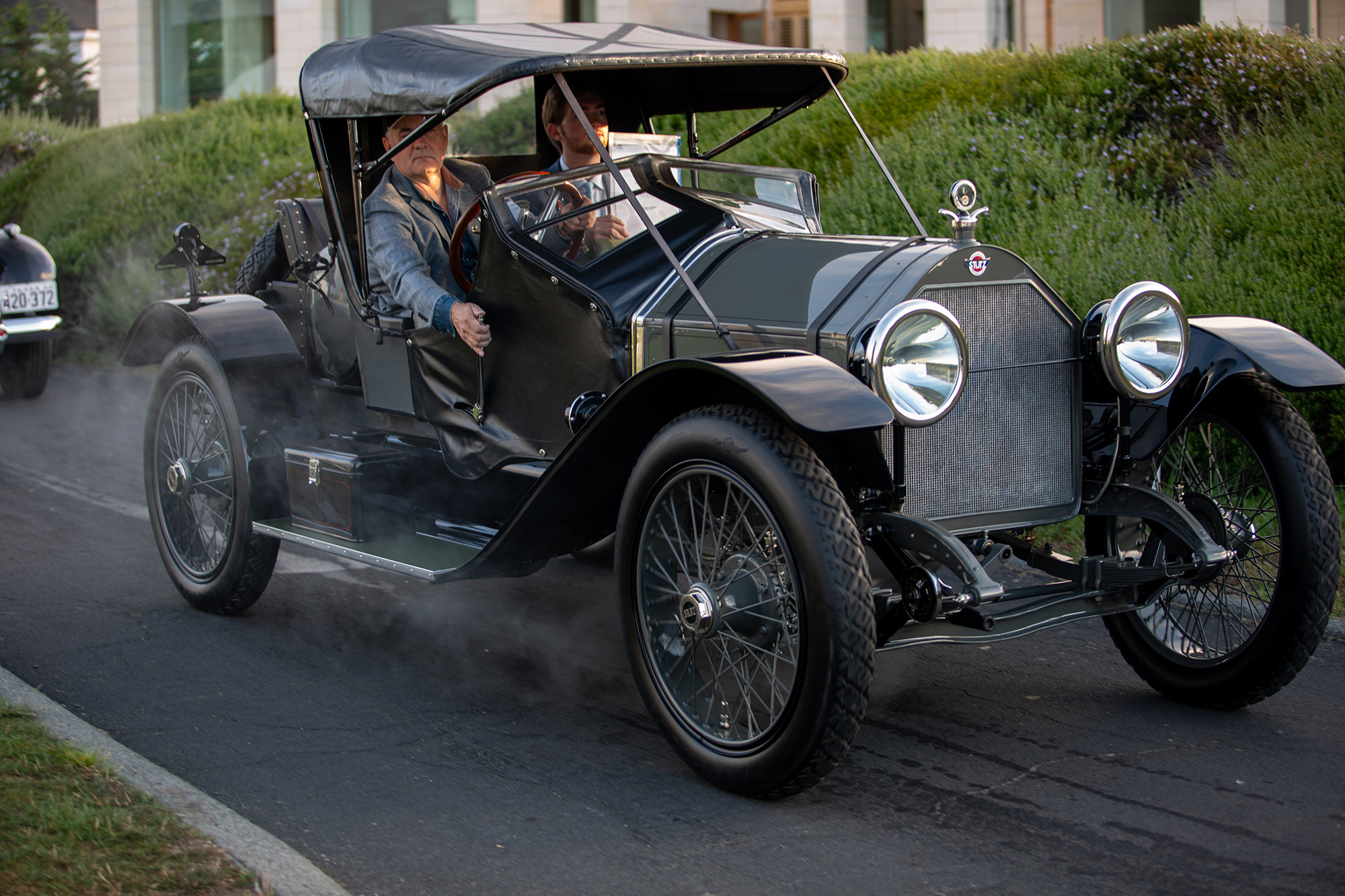 1916 Stutz 4C Bearcat, front quarter, on a paved path, Pebble Beach
