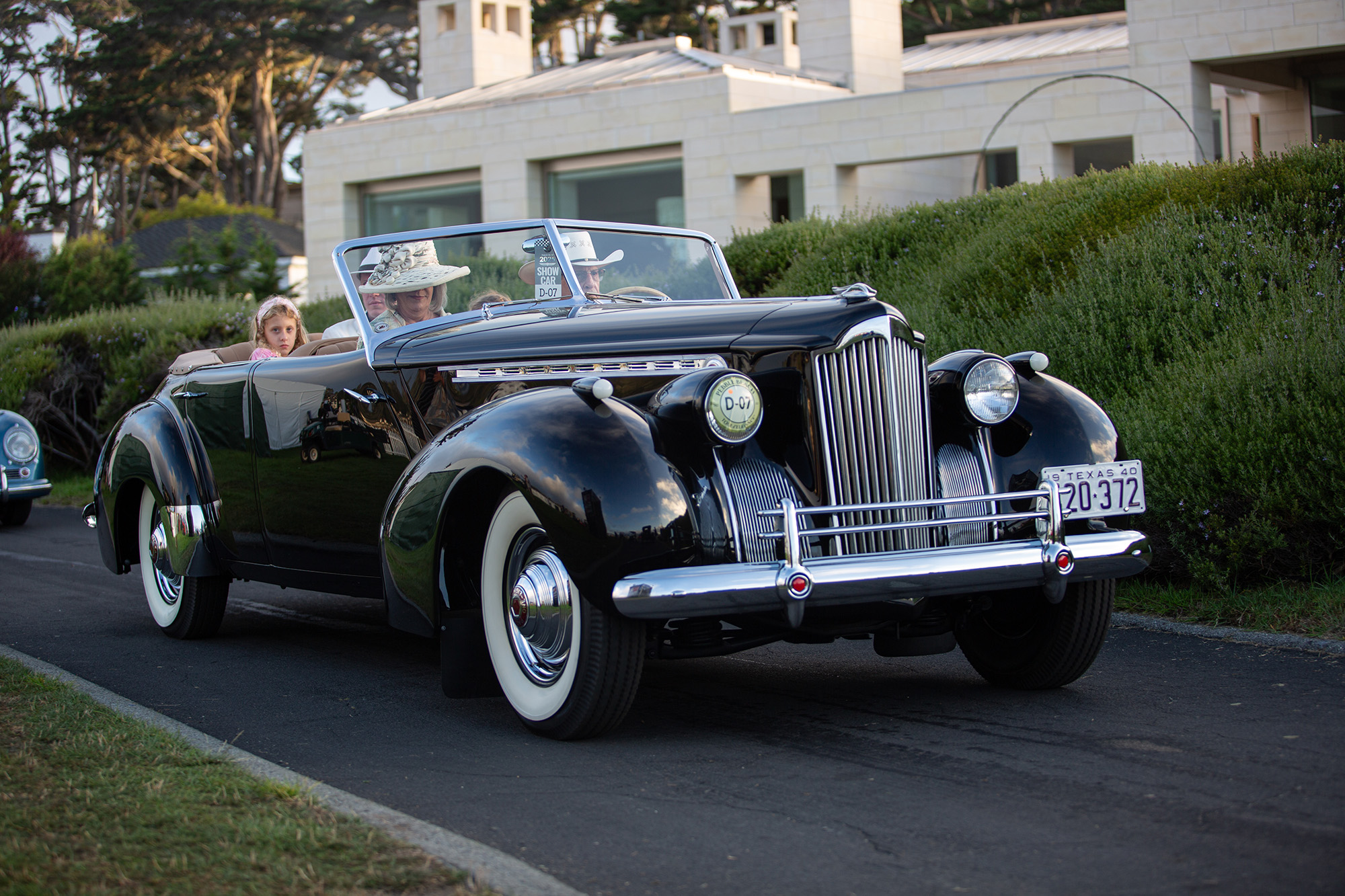 1940 Packard 1807 Custom Super Eight Convertible Sedan, front quarter, on pavement, going to Pebble Beach Concours