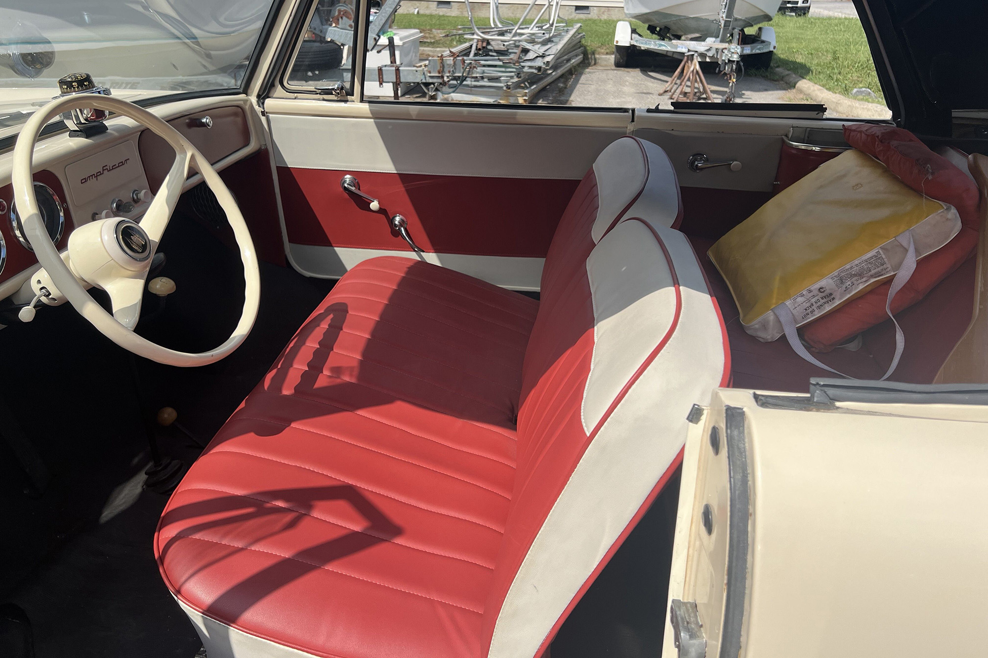 1964 Amphicar Model 770, cream with a black top, interior, top up
