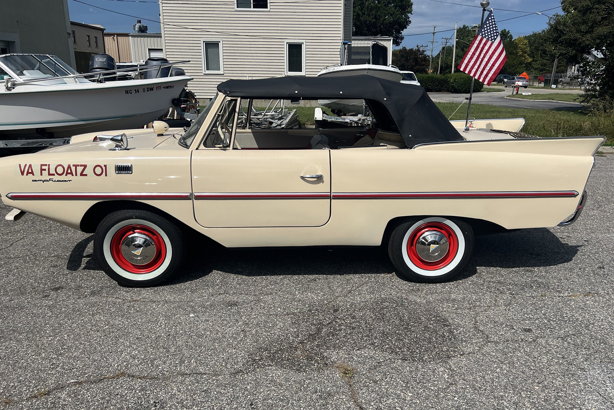 1964 Amphicar Model 770, cream with a black top, side view, top up