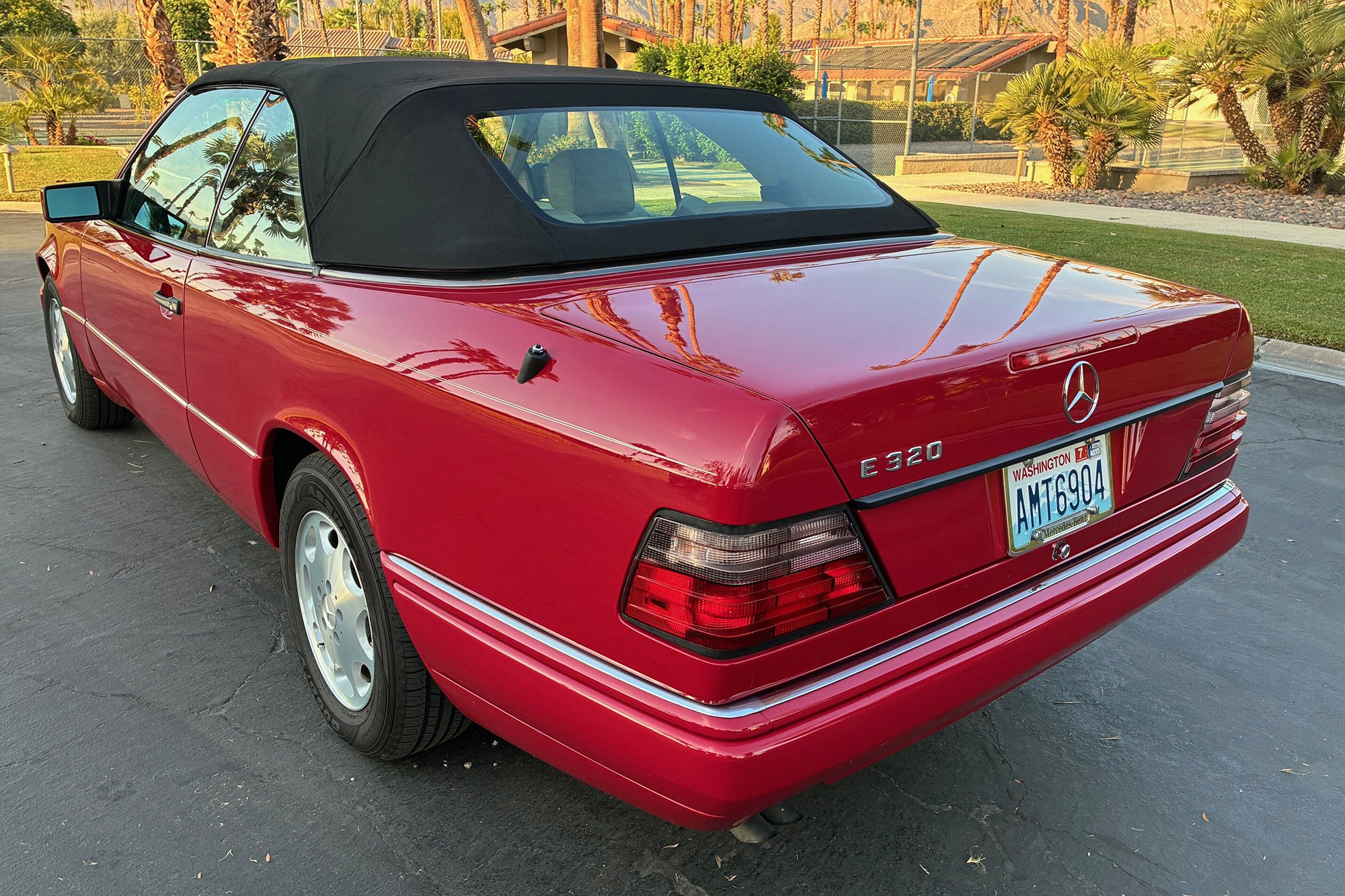 1995 Mercedes-Benz E320 Convertible , red with a black top, rear quarter, top up