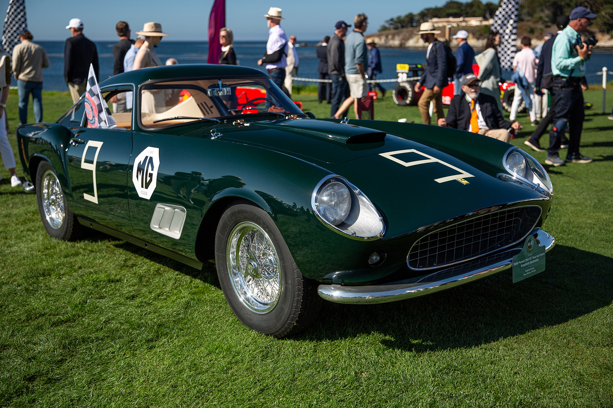 1959 Ferrari 250 GT Tour de France, dark green, front quarter, parked on grass at Pebble Beach Concours,