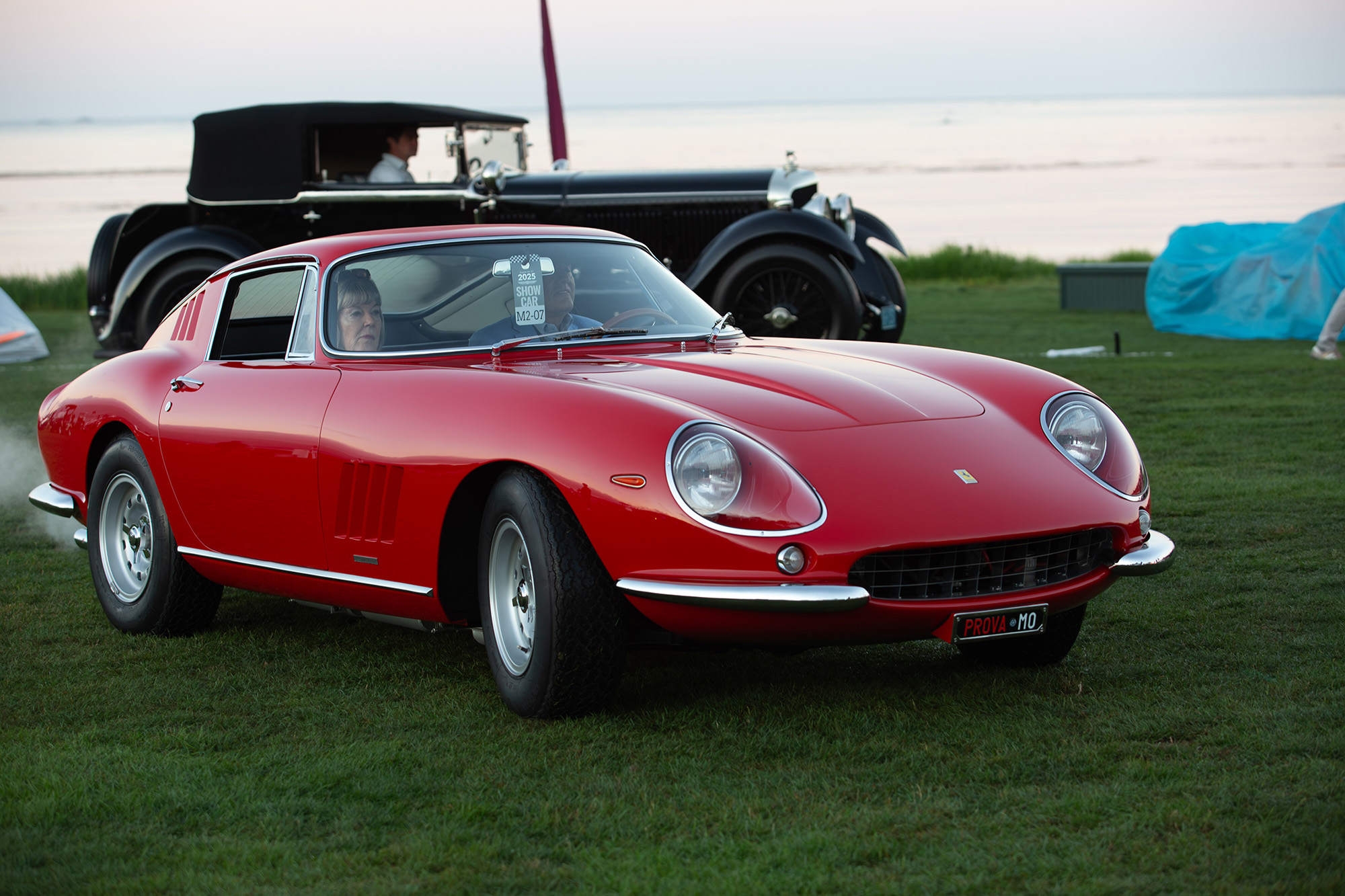 1967 Ferrari 275 GTB/4 Berlinetta, red,  front quarter, driving on grass, smoke from exhaust
