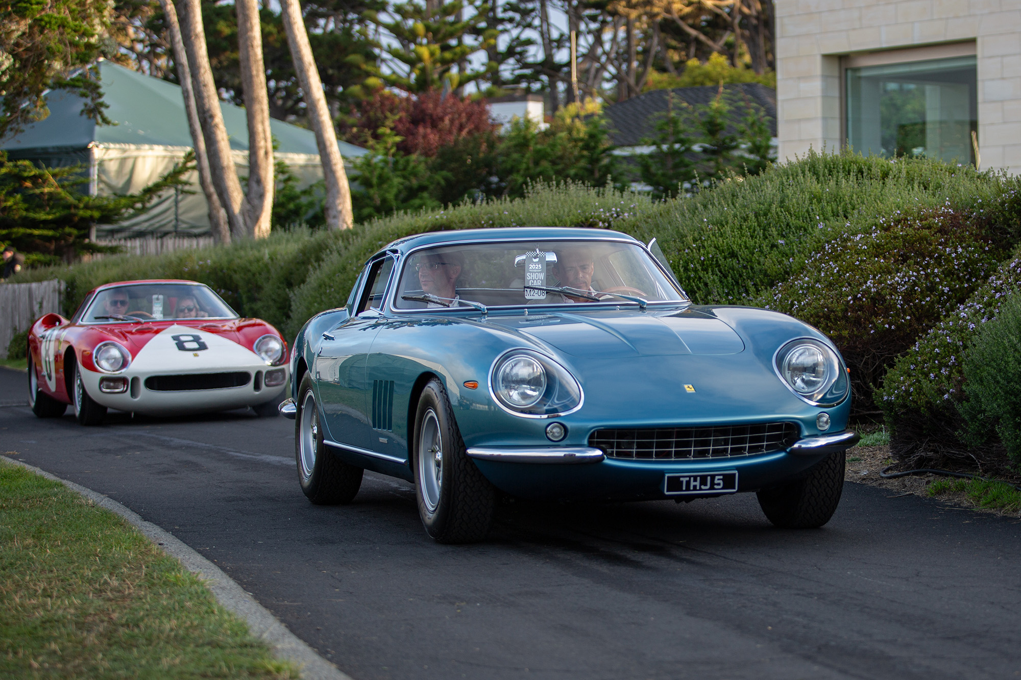 1967 Ferrari 275 GTB/4 Berlinetta, front quarter, on paved path heading toward the Pebble Beach Concours show field
