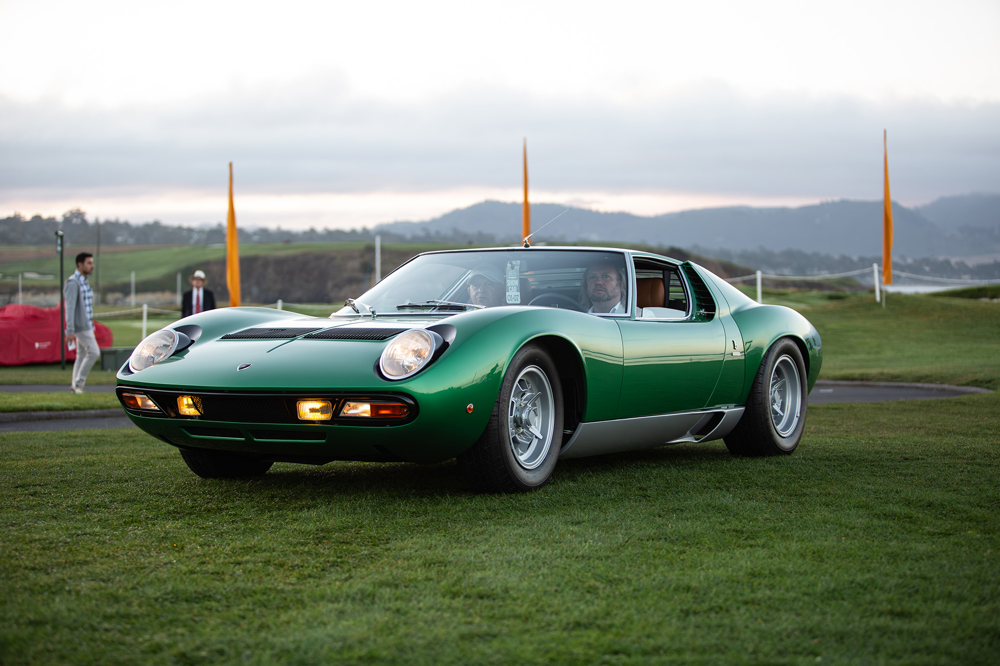 1971 Lamborghini Miura P400 SV, front quarter, driving into the show field at Pebble Beach Concours, Verde Metalizzato. 