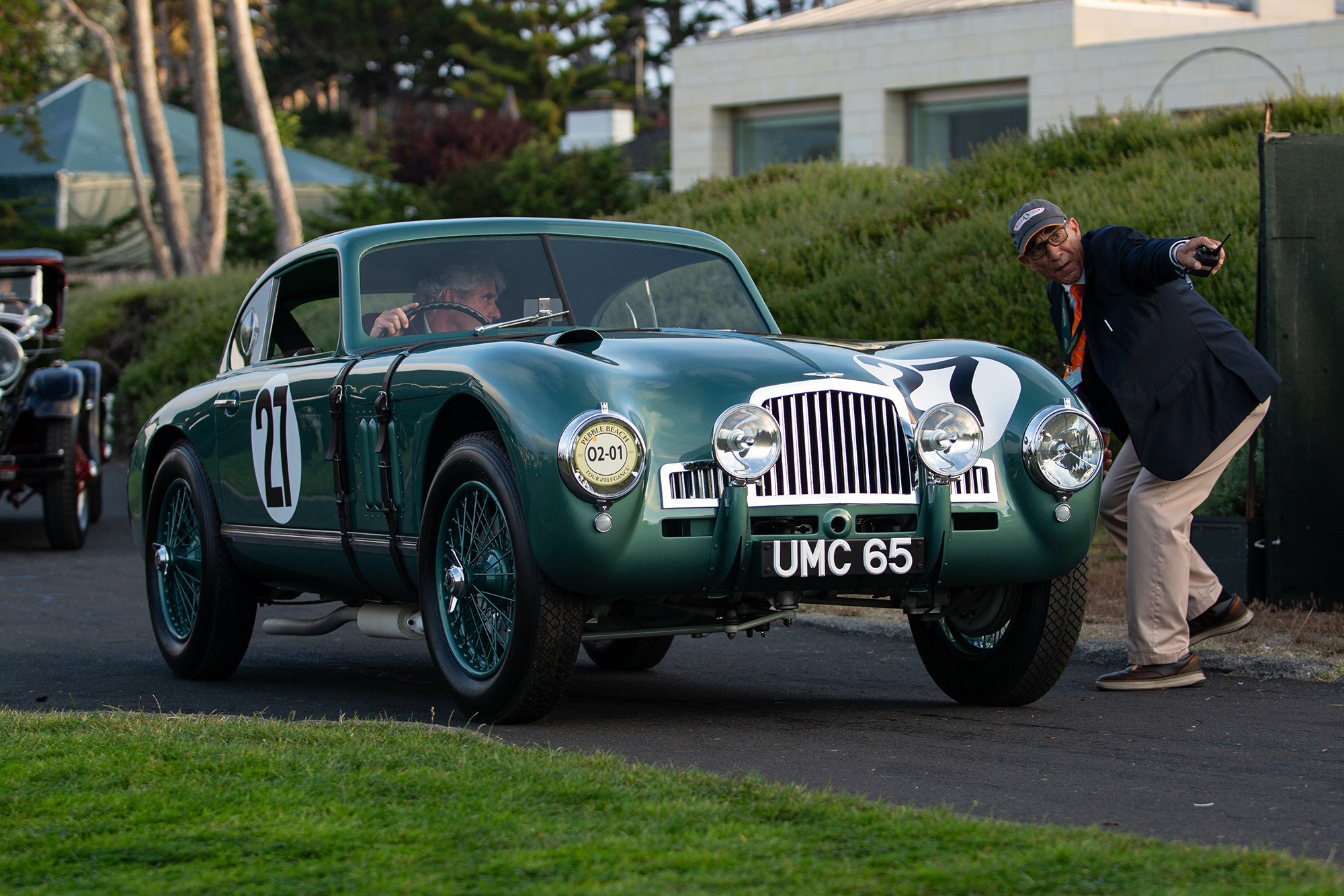 1949 Aston Martin DB2 stopping to get instructions to enter the show field at Pebble Beach, front quarter, pavement