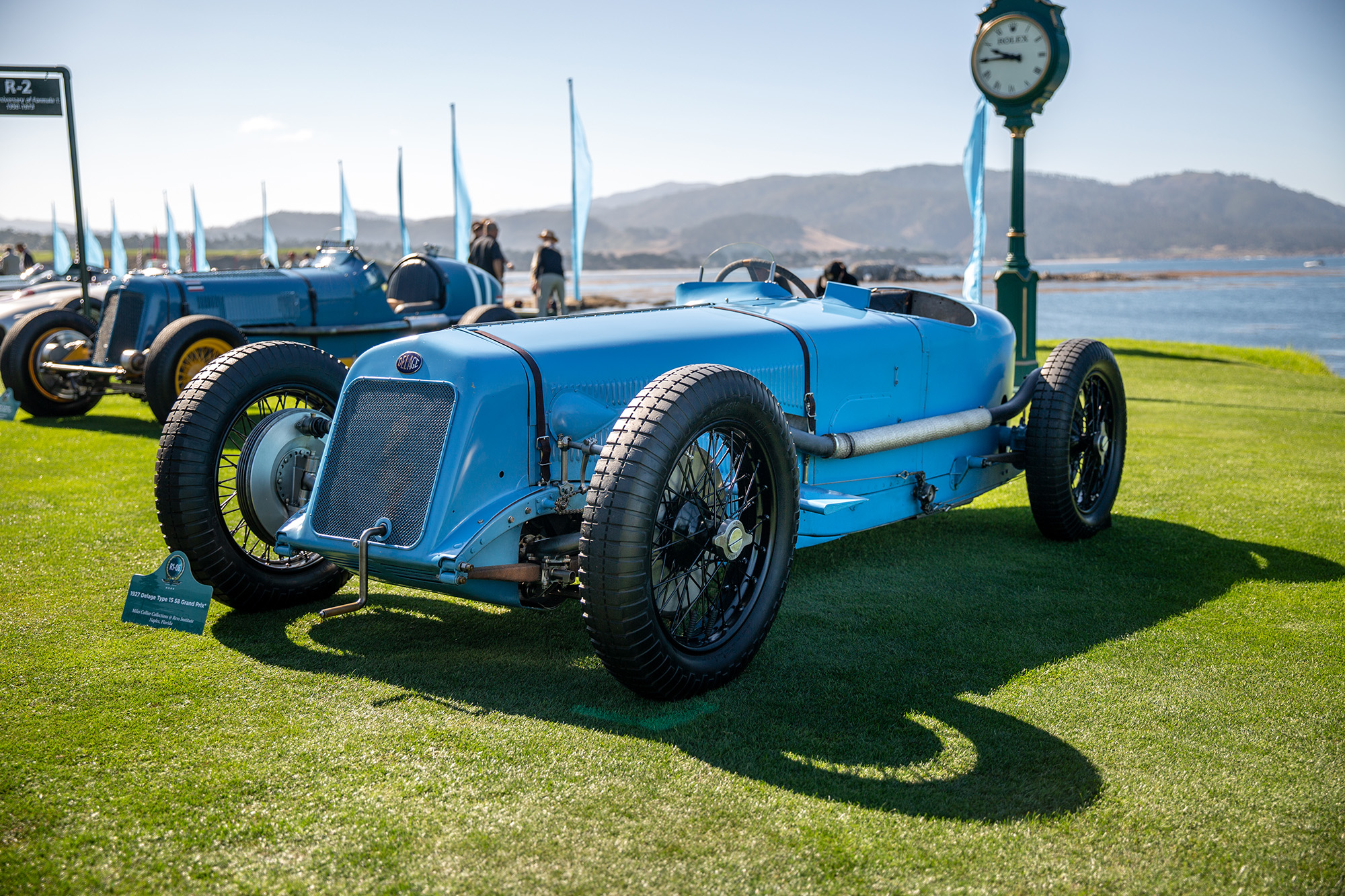 1927 Delage Type 15 S8 Grand Prix, front quarter, in front of a field of similar race cars at Pebble Beach Concours