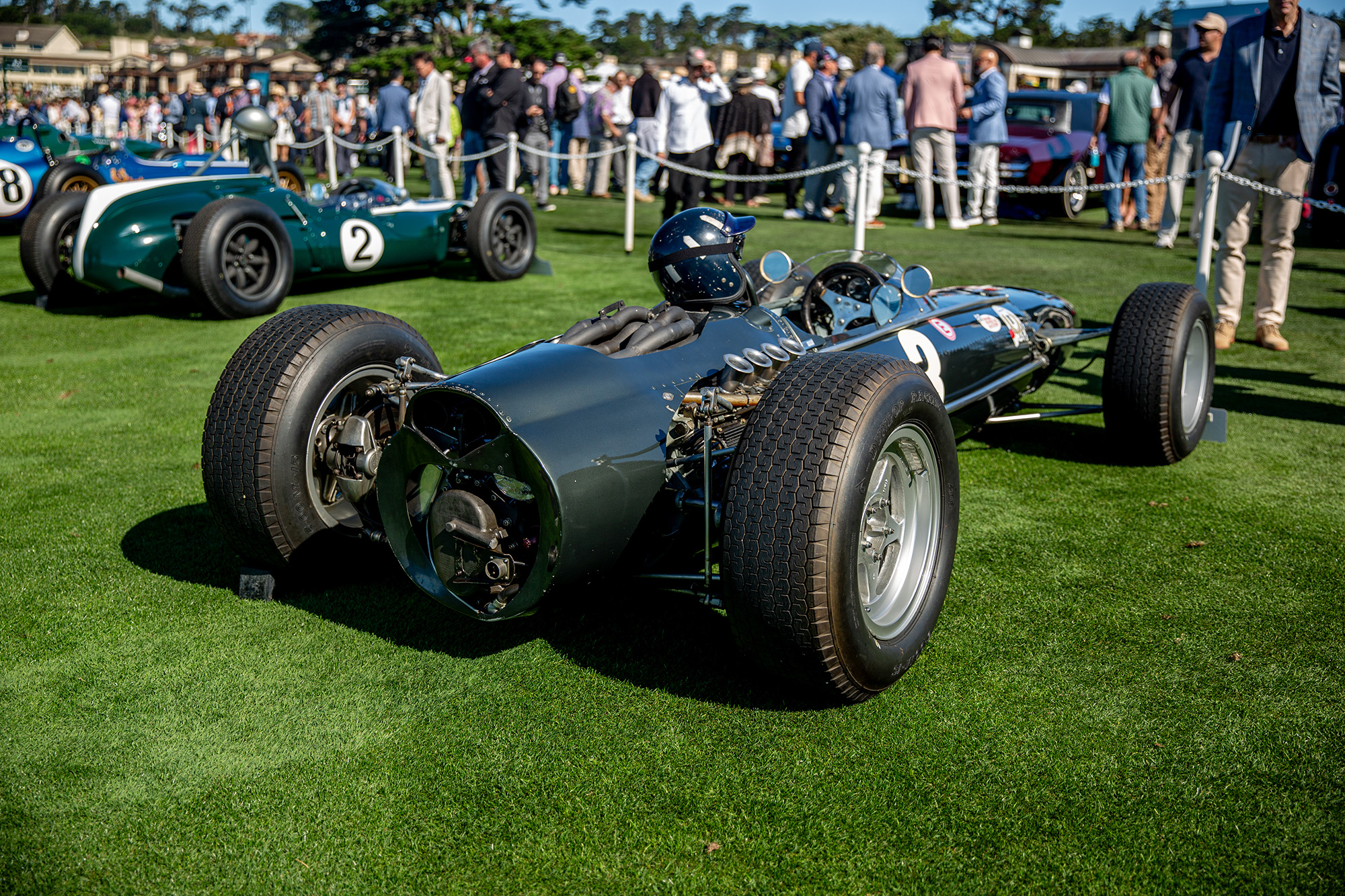 1961 Cooper T55, rear quarter, with crowds on the other side of the car at Pebble Beach Concours
